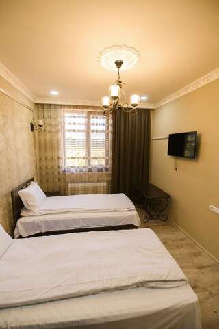Отель KARNEL Hotel Sanain Двухместный номер с 2 отдельными кроватями и душем-4